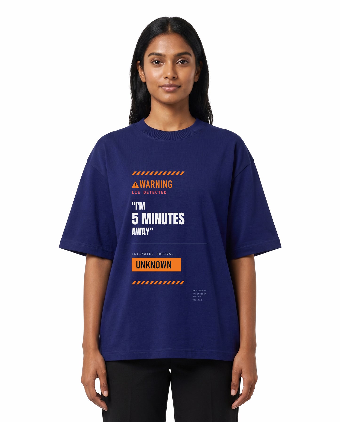 Front view of female model wearing 5 MINS AWAY unisex oversized graphic t-shirt in royal blue in a studio setting.