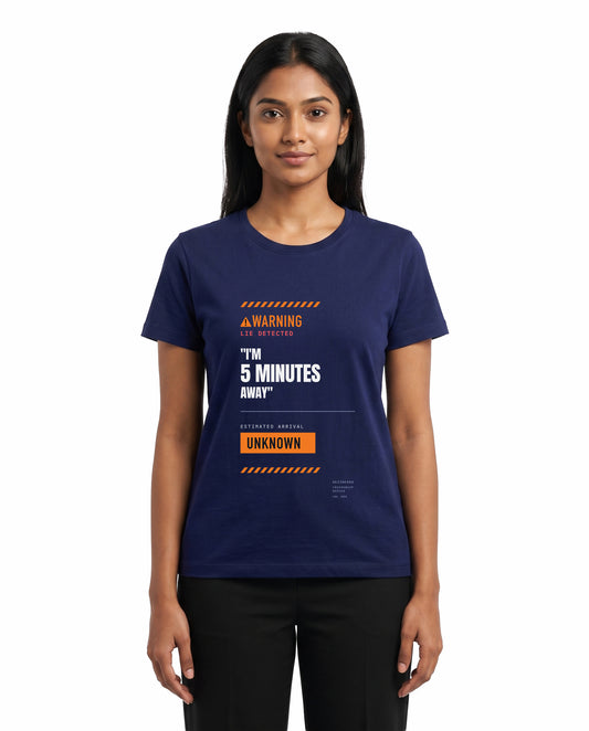 Female model wearing 5 MINS AWAY women's regular-fit t-shirt in royal blue in a studio setting.