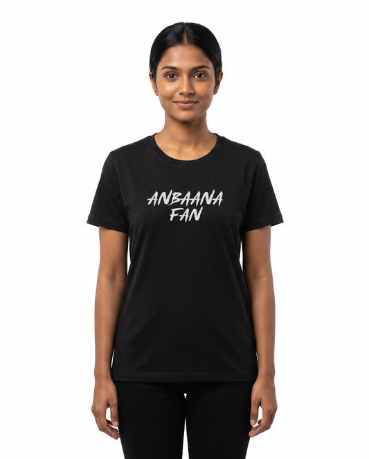Female model wearing ANBAANA FAN women's regular-fit t-shirt in black in a studio setting.