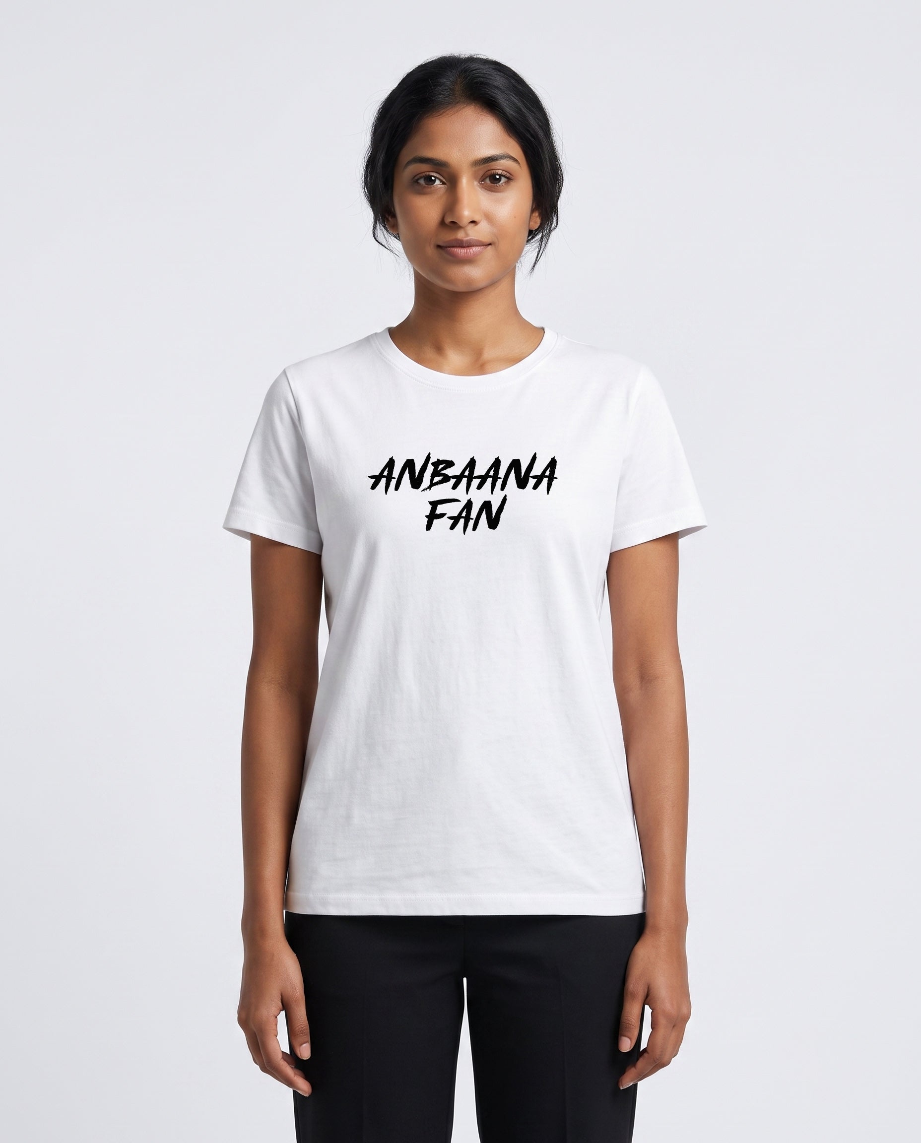 Female model wearing ANBAANA FAN women's regular-fit t-shirt in white in a studio setting.