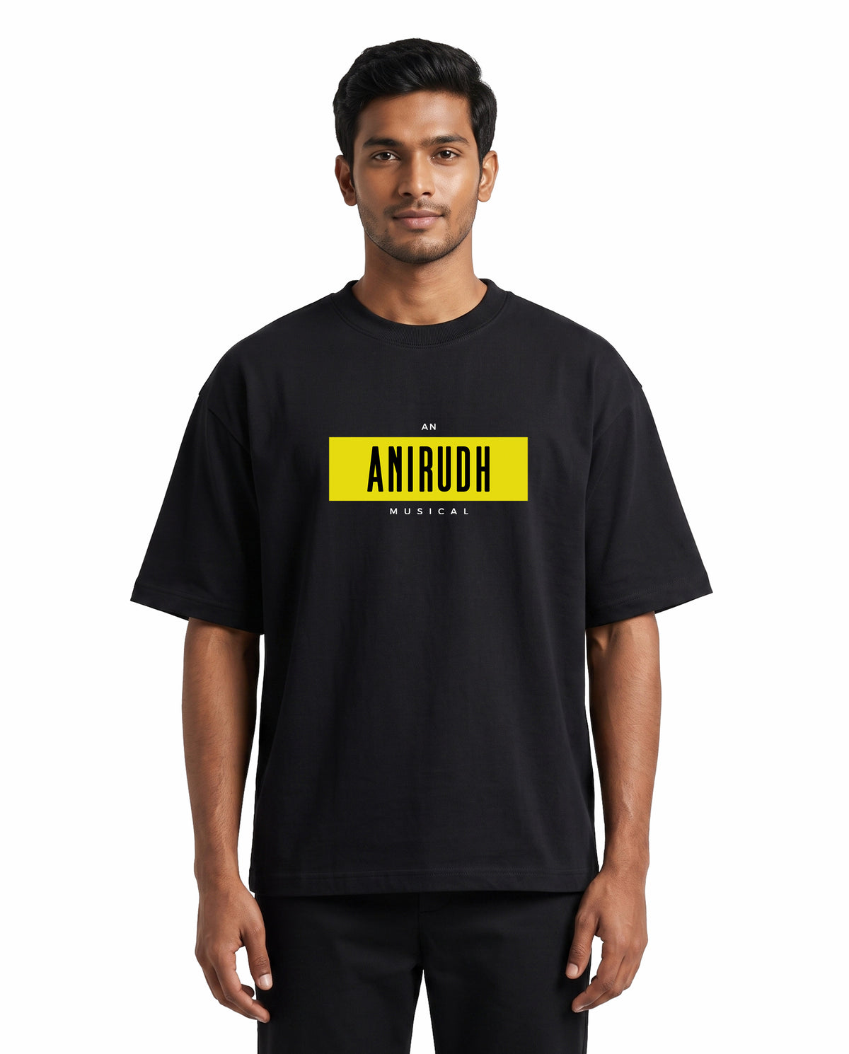 Front view of male model wearing ANI MUSICAL - Unisex Oversized Graphic T-Shirt in black in a studio setting.