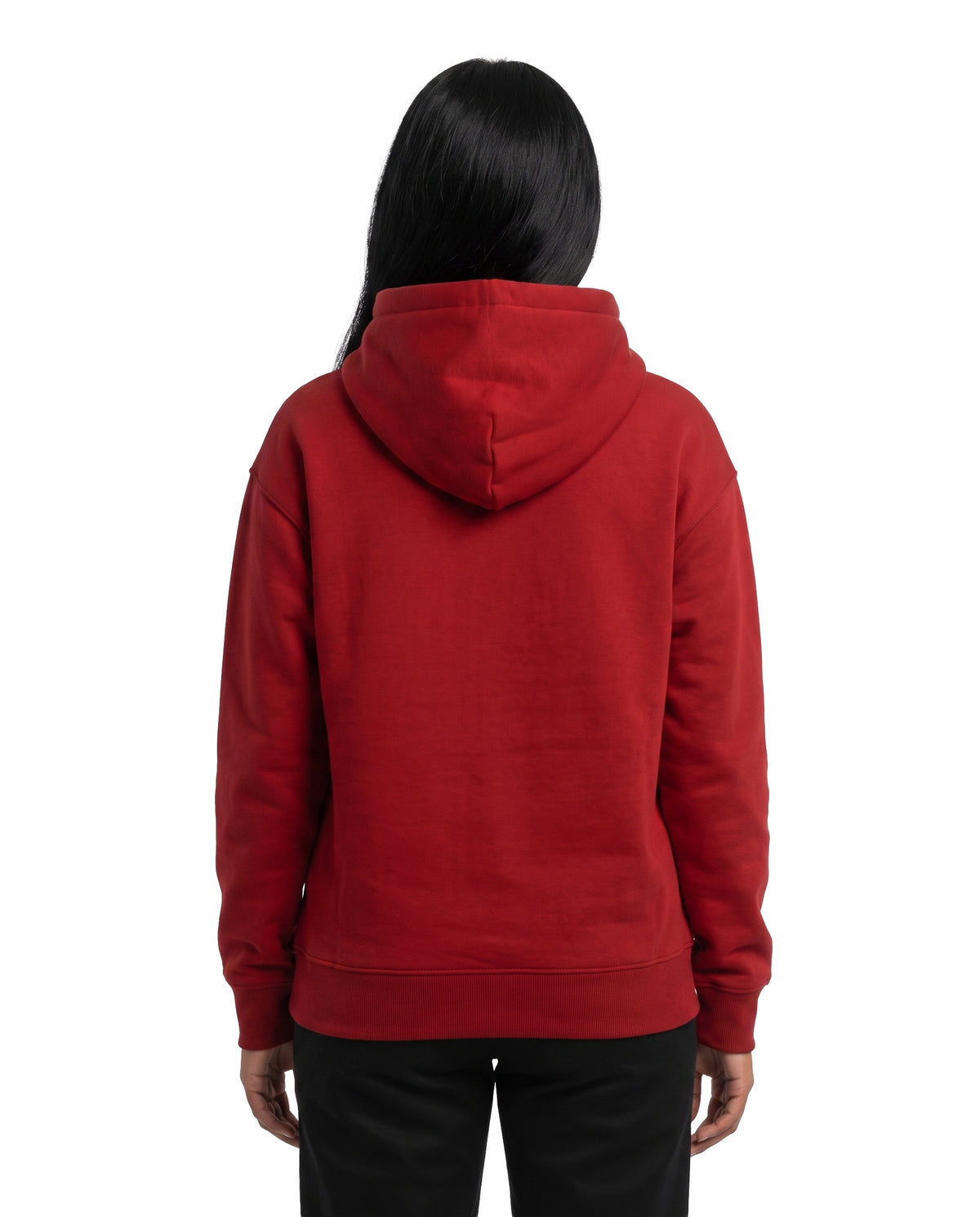 Back view of female model wearing ANI RULES - Unisex Regular Fit Hoodie in red in a studio setting.