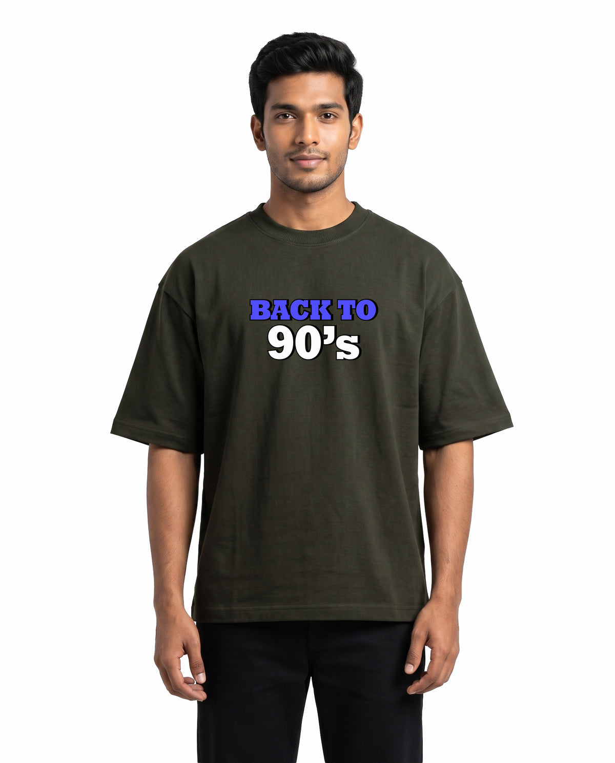 Front view of male model wearing ARR 90S HITS - Unisex Oversized Graphic T-Shirt in olive green in a studio setting.