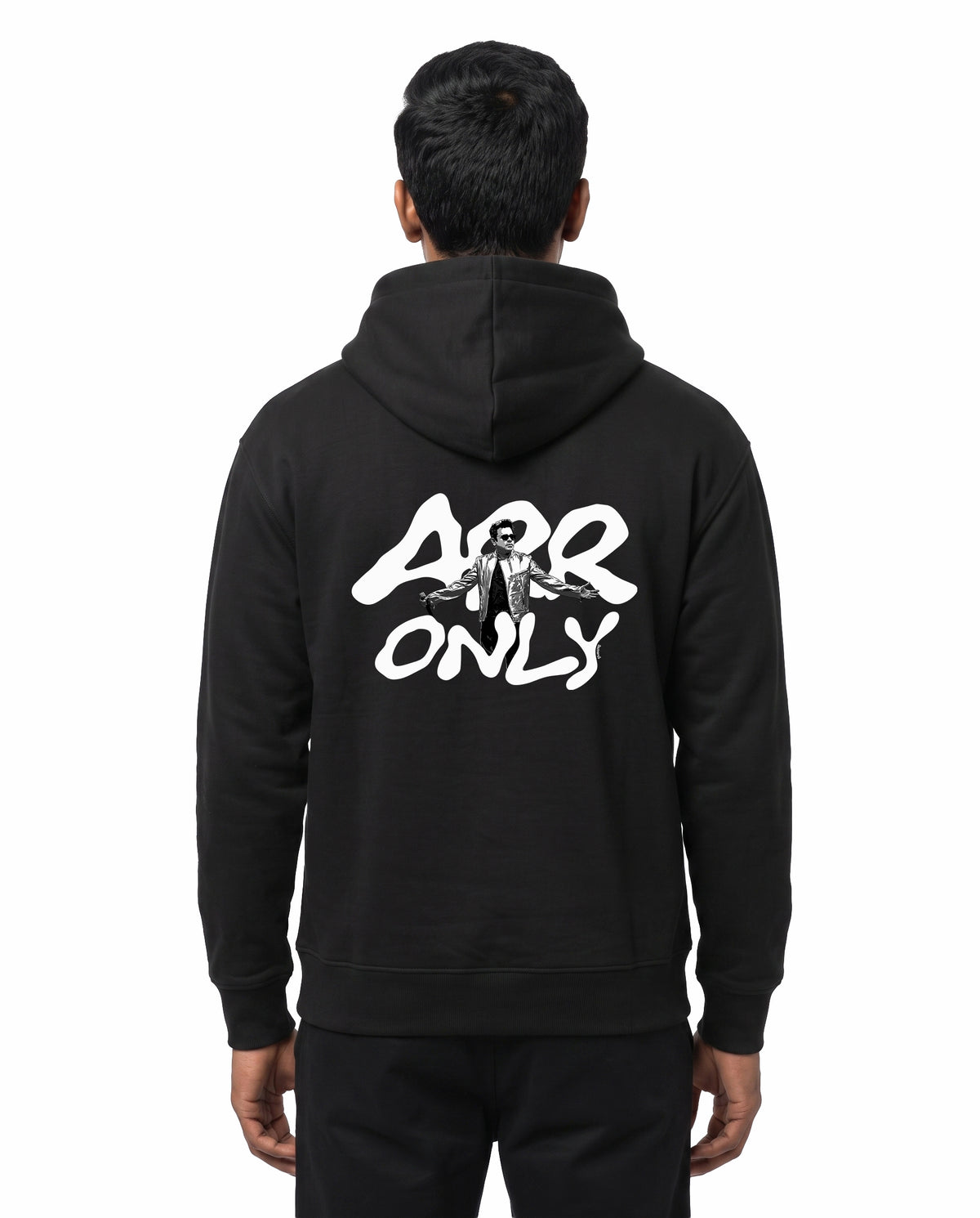 Back view of male model wearing ARR TRIBUTE - Unisex Regular Fit Hoodie in black in a studio setting.