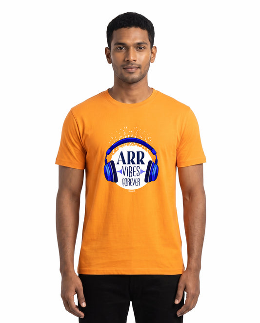 Front view of male model wearing ARR VIBES - Men's Regular Fit T-Shirt in golden yellow in a studio setting.