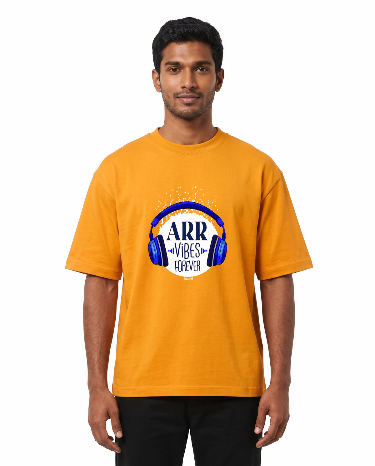Front view of male model wearing ARR VIBES - Unisex Oversized Graphic T-Shirt in golden yellow in a studio setting.