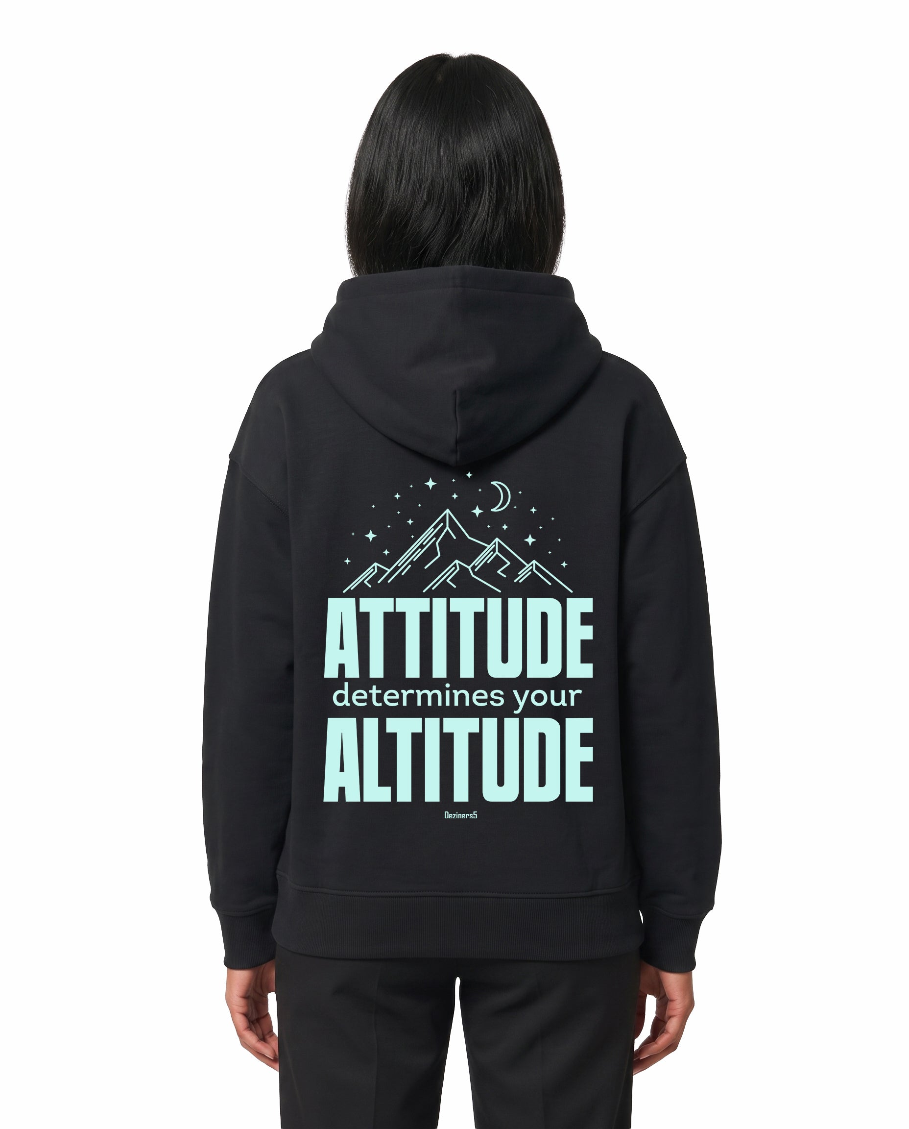 Back view of female model wearing ATTITUDE - Unisex Regular Fit Hoodie in black in a studio setting.