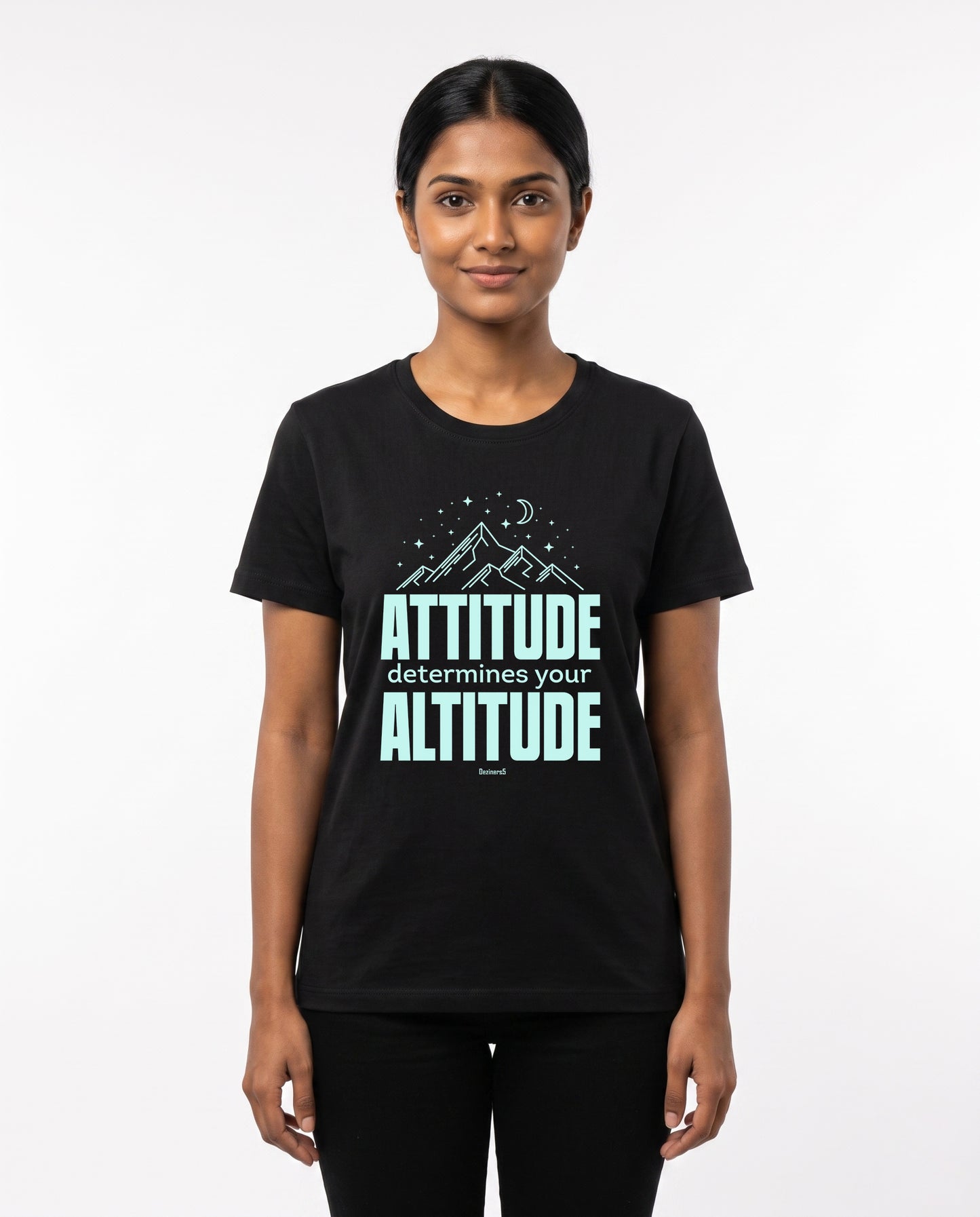 Female model wearing ATTITUDE women's regular-fit t-shirt in black in a studio setting.