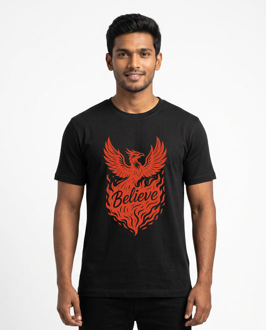 Male model wearing BELIEVE men's regular-fit t-shirt in black in a studio setting.