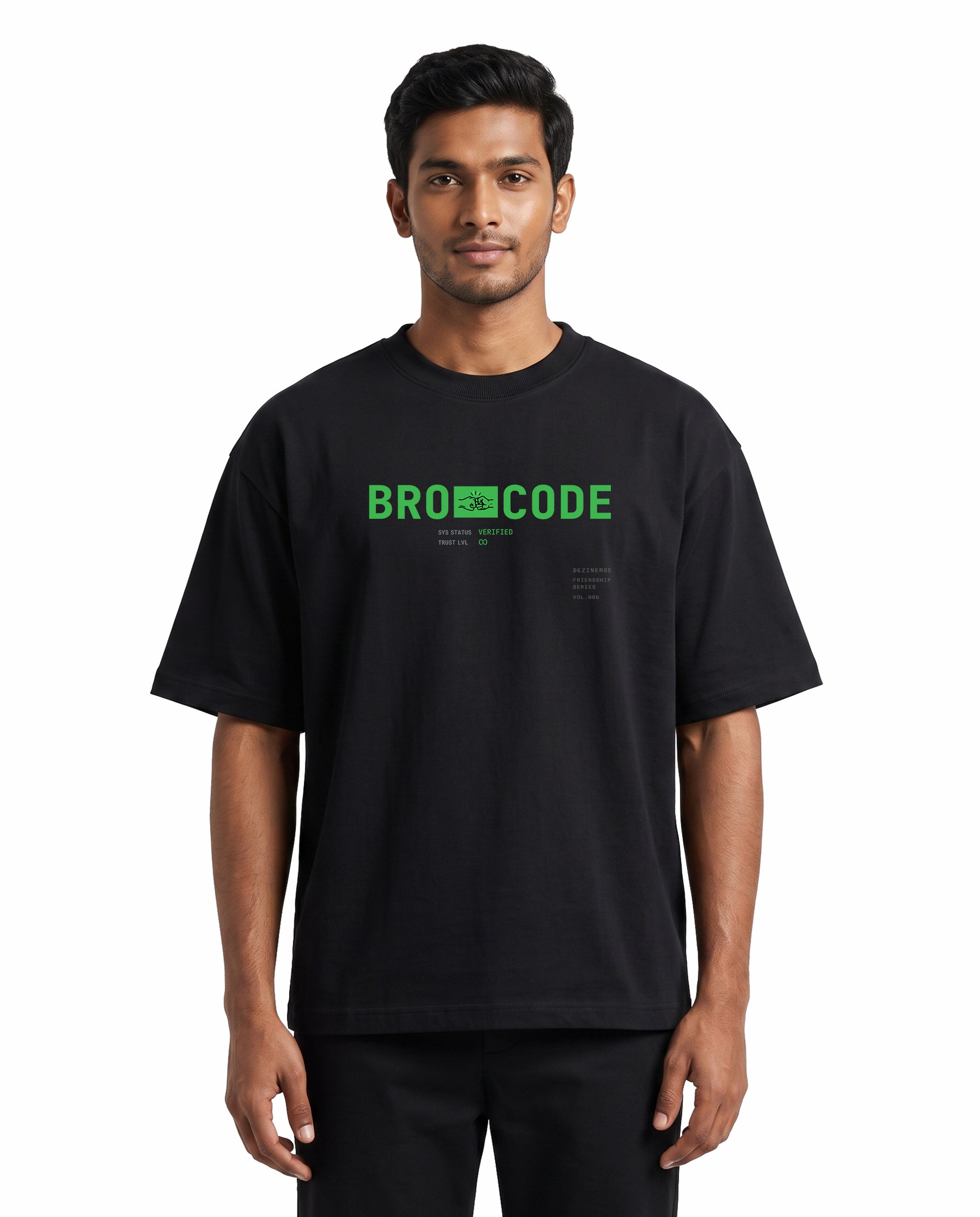 Front view of male model wearing BRO CODE unisex oversized graphic t-shirt in black in a studio setting.
