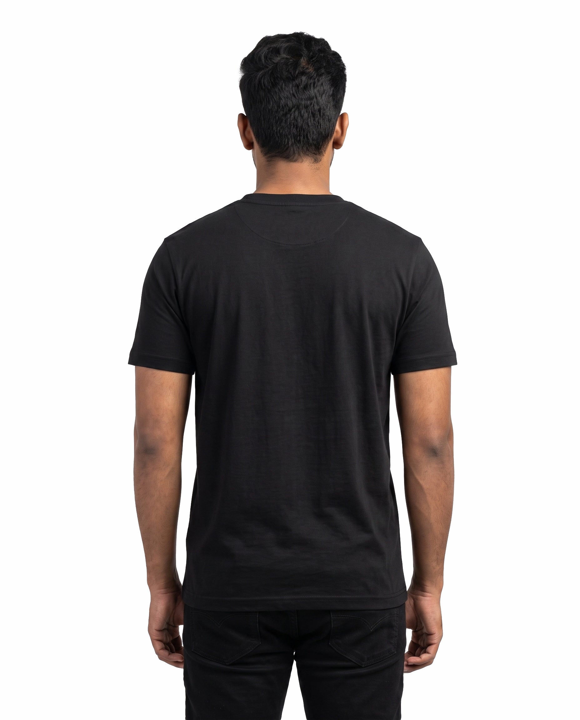 Back view of male model wearing DADDY'S HOME men's regular-fit t-shirt in black in a studio setting.