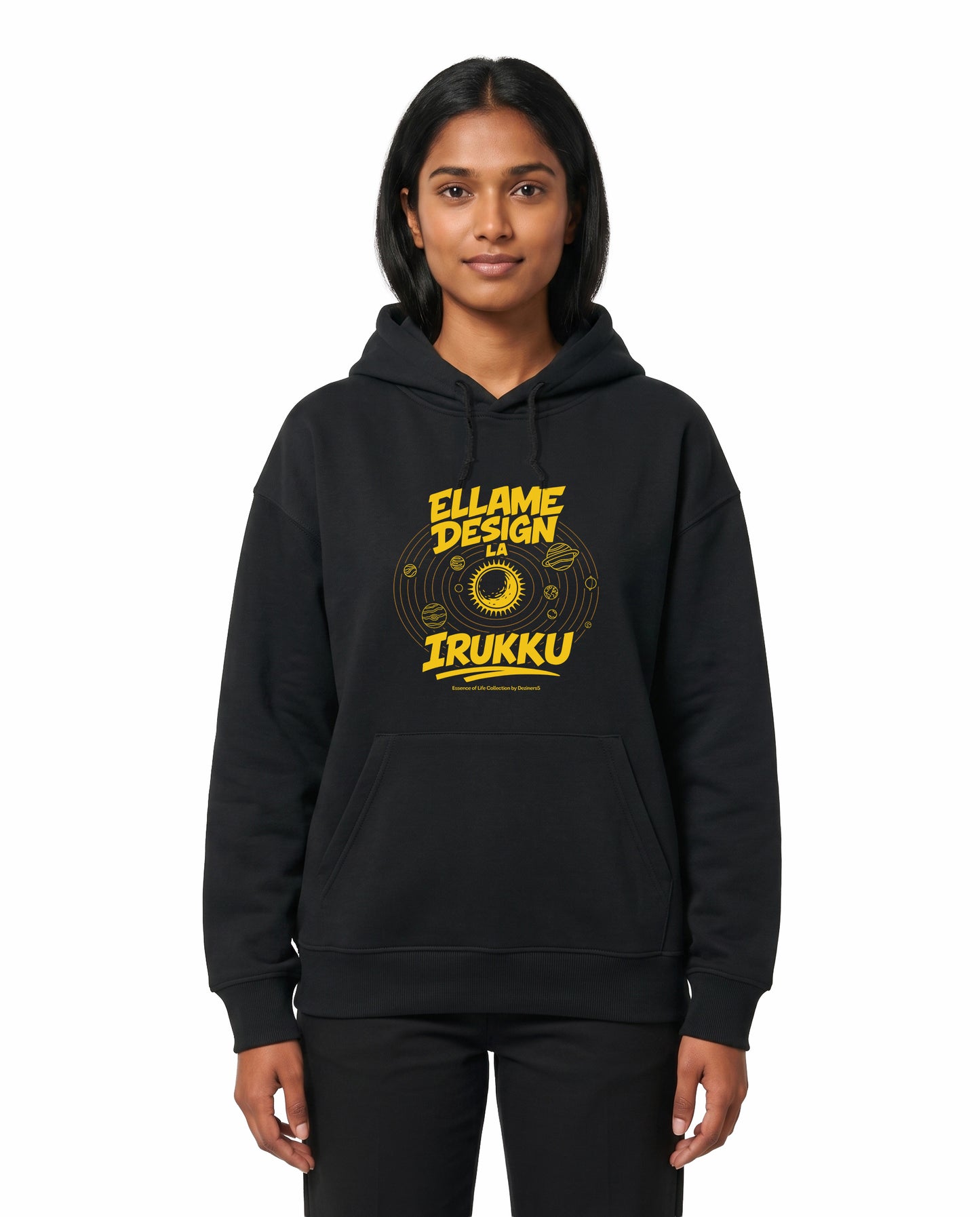 Front view of female model wearing ELLAME DESIGNLA IRUKKU - Unisex Regular Fit Hoodie in black in a studio setting.