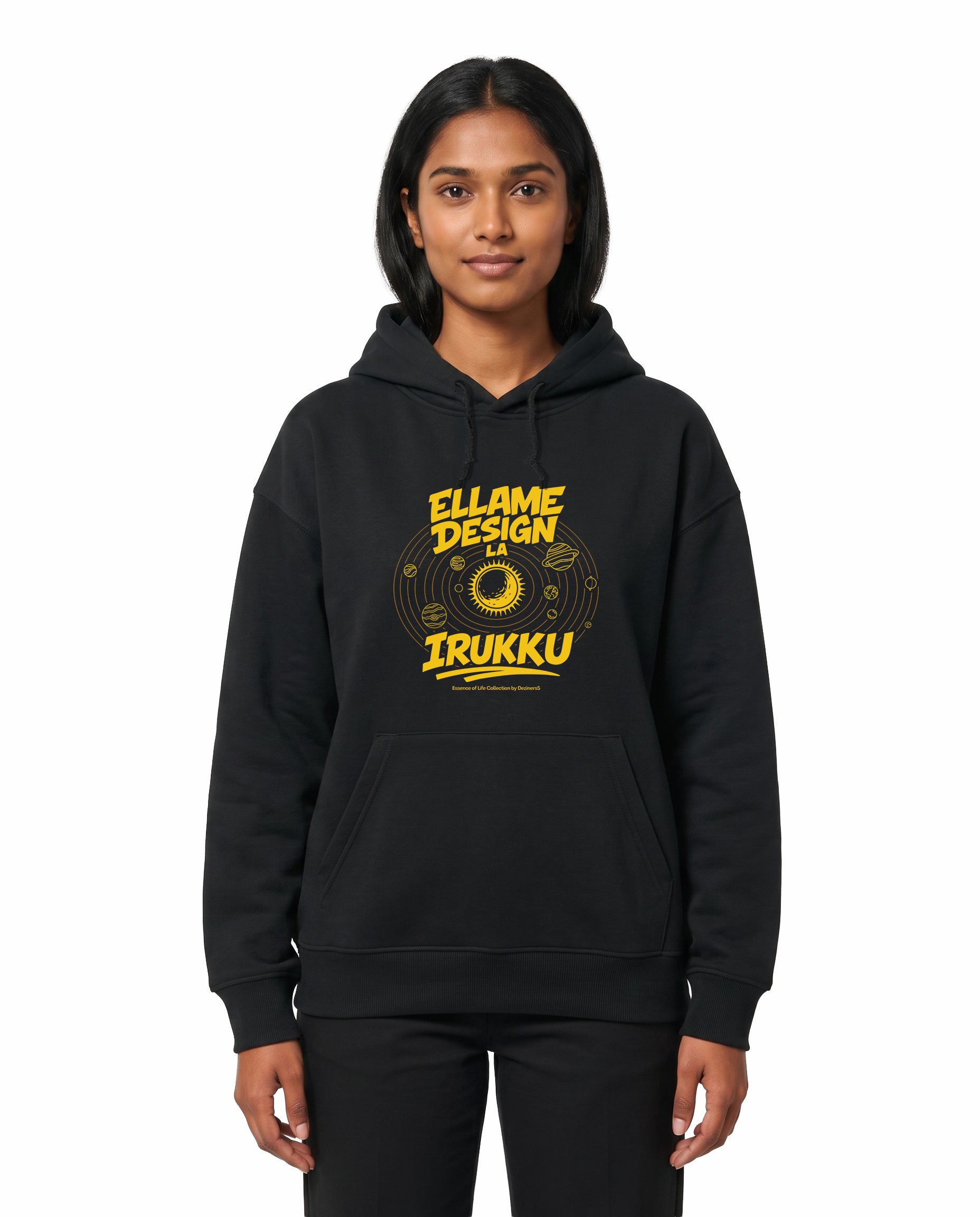 Front view of female model wearing ELLAME DESIGNLA IRUKKU - Unisex Regular Fit Hoodie in black in a studio setting.