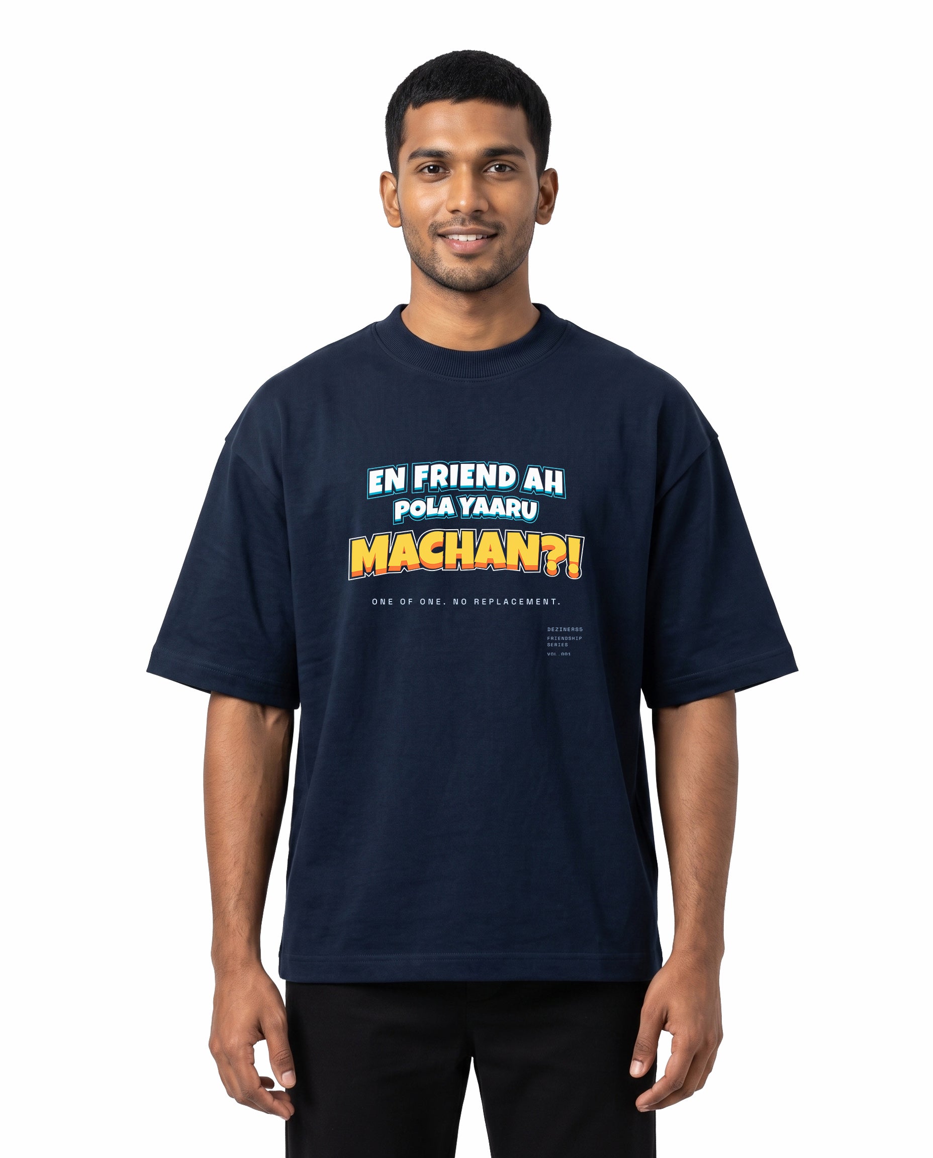 Front view of male model wearing EN FRIEND AH POLA YAARU MACHAN unisex oversized graphic t-shirt in navy blue in a studio setting.