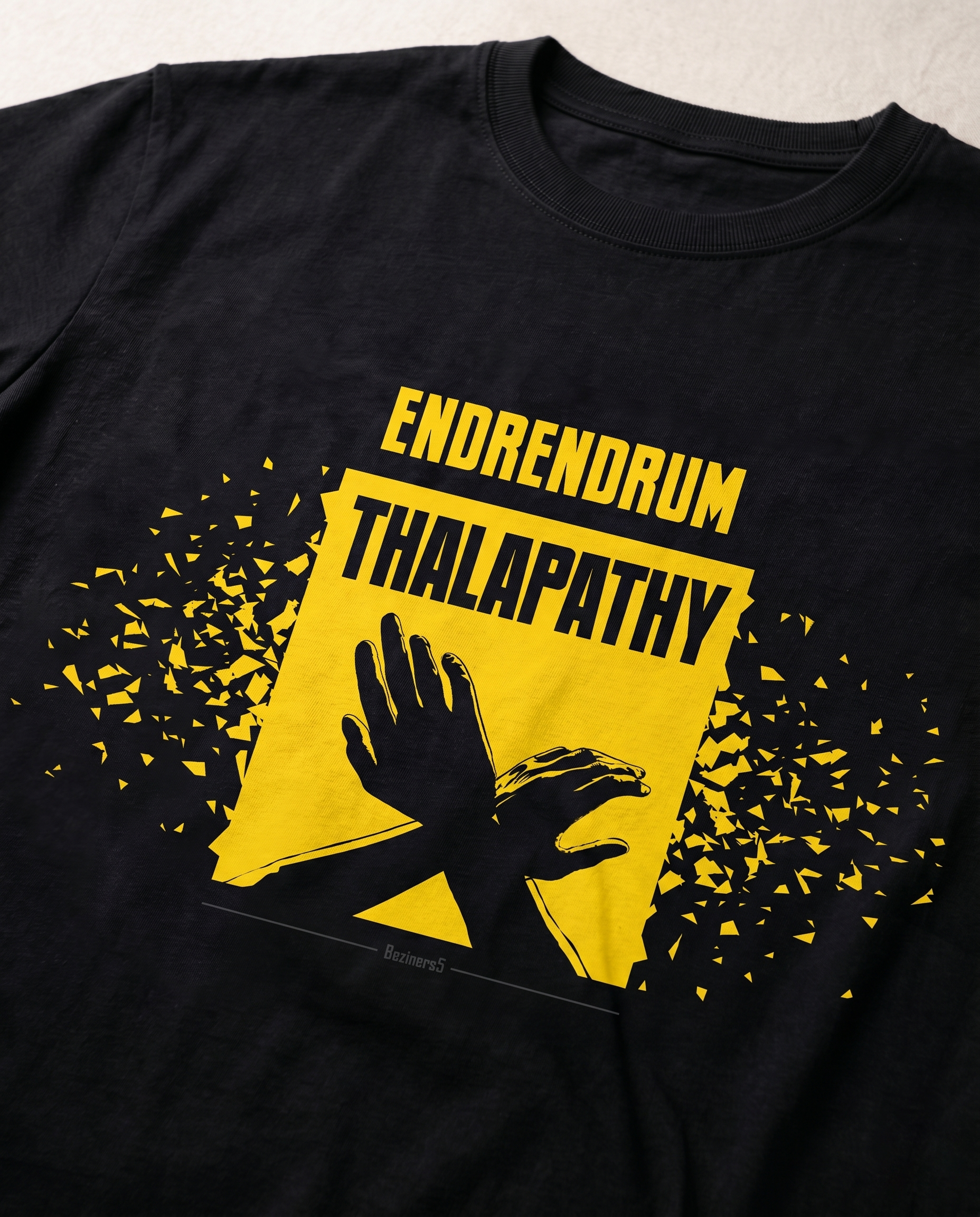 Detailed close-up of the ENDRENDRUM THALAPATHY front graphic print on a black men's regular-fit t-shirt.