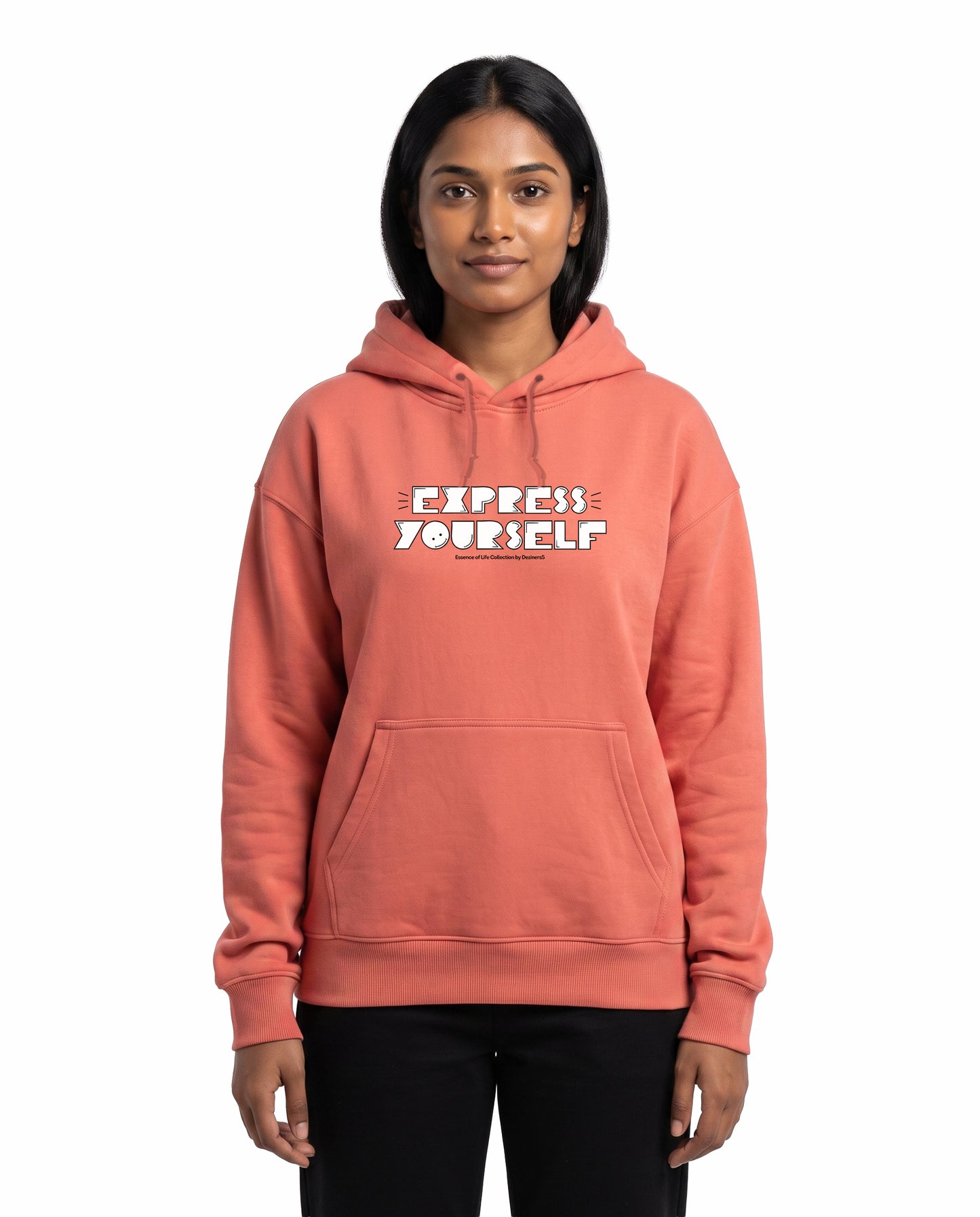 Front view of female model wearing EXPRESS YOURSELF - Unisex Regular Fit Hoodie in coral in a studio setting.
