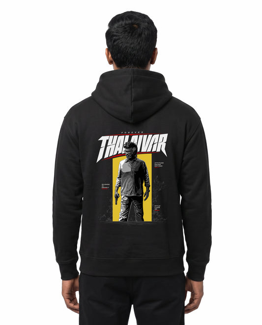 Back view of male model wearing FOREVER THALAIVAR - Unisex Regular Fit Hoodie in black in a studio setting.