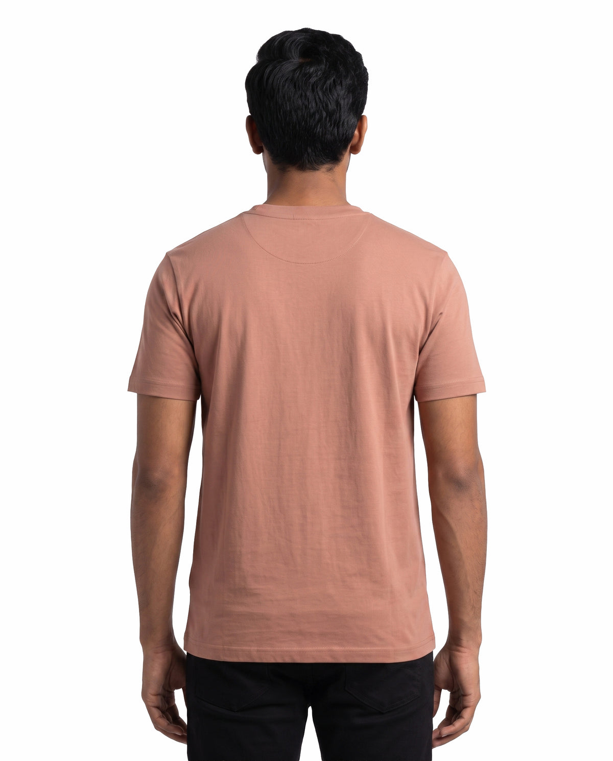 Back view of male model wearing GANESH – Devotional Men's Regular Fit T-Shirt in mushroom in a studio setting.