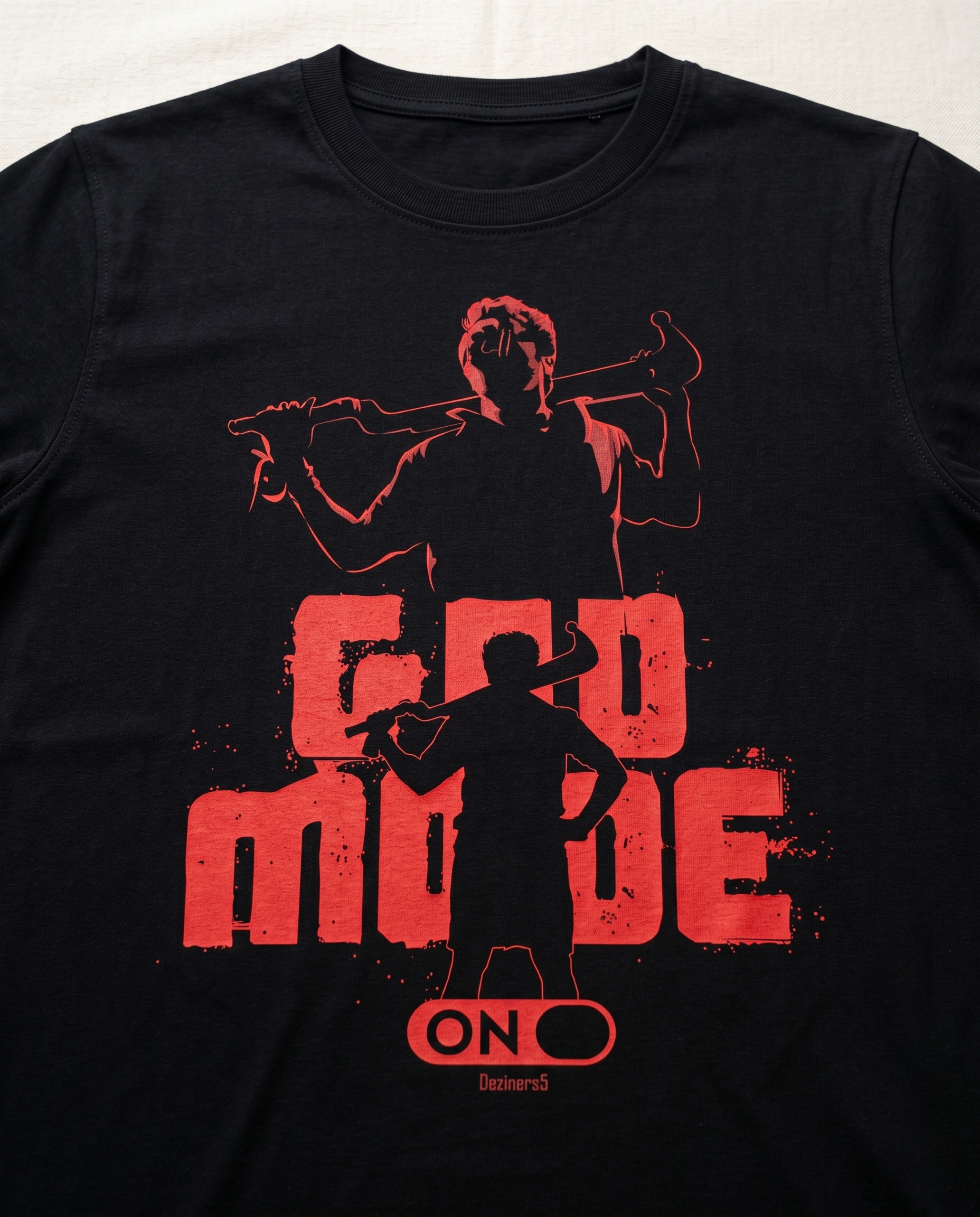 Close-up view of the GOD MODE front graphic print highlighting premium print quality and design details on a black men's regular-fit t-shirt.