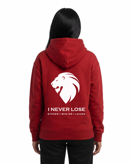 Back view of female model wearing I NEVER LOSE - Unisex Regular Fit Hoodie in red in a studio setting.