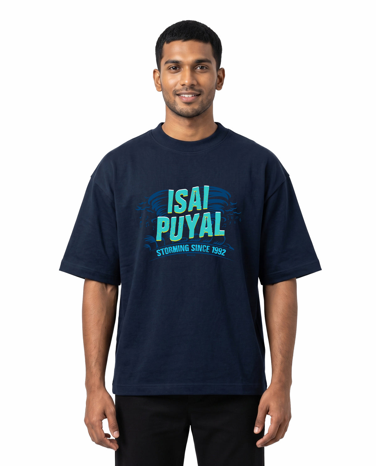 Front view of male model wearing ISAIPUYAL - Unisex Oversized Graphic T-Shirt in navy blue in a studio setting.