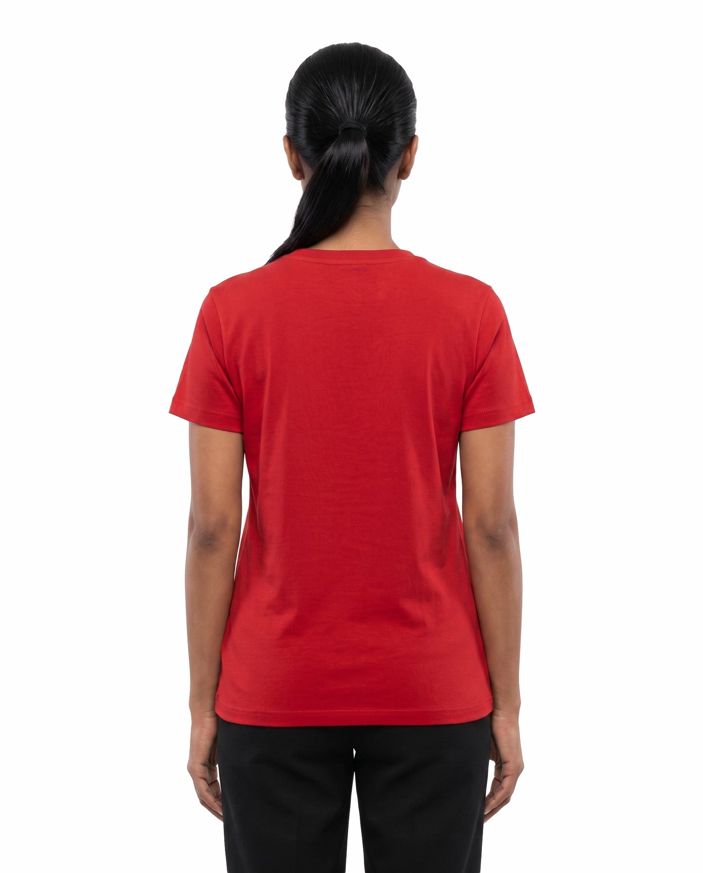 Back view of female model wearing NAAN VEEZHVENENDRU NINAITHAAIYO women's regular-fit t-shirt in red in a studio setting.