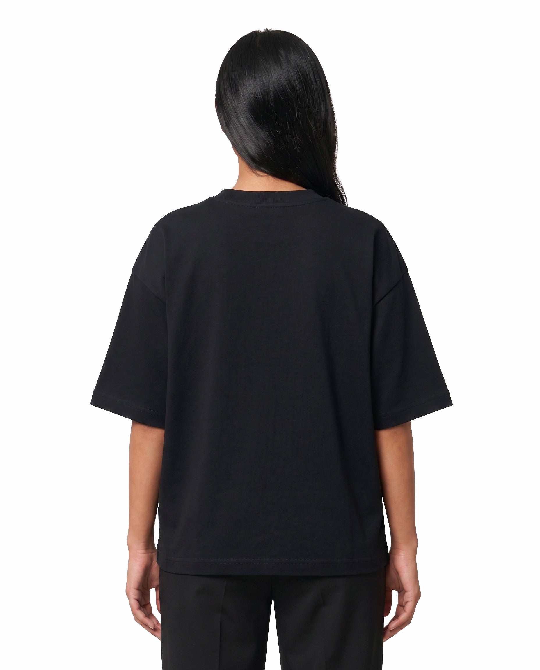 Back view of female model wearing NANBI oversized graphic t-shirt in black in a studio setting.