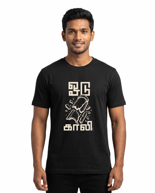 Male model wearing ODUGAALI men's regular-fit t-shirt in black in a studio setting.