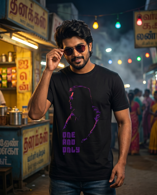 Young South Indian male wearing ONE AND ONLY Superstar inspired black men's regular-fit t-shirt in a cinematic lifestyle setting.