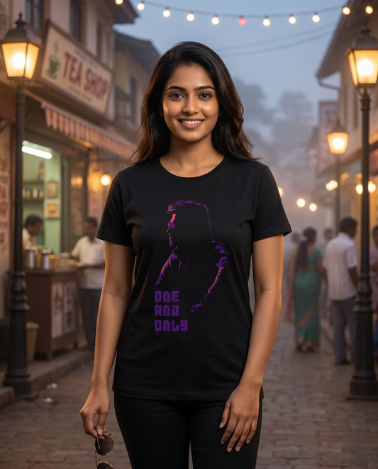 Young South Indian female wearing ONE AND ONLY Superstar inspired black women's regular-fit t-shirt in a cinematic lifestyle setting.