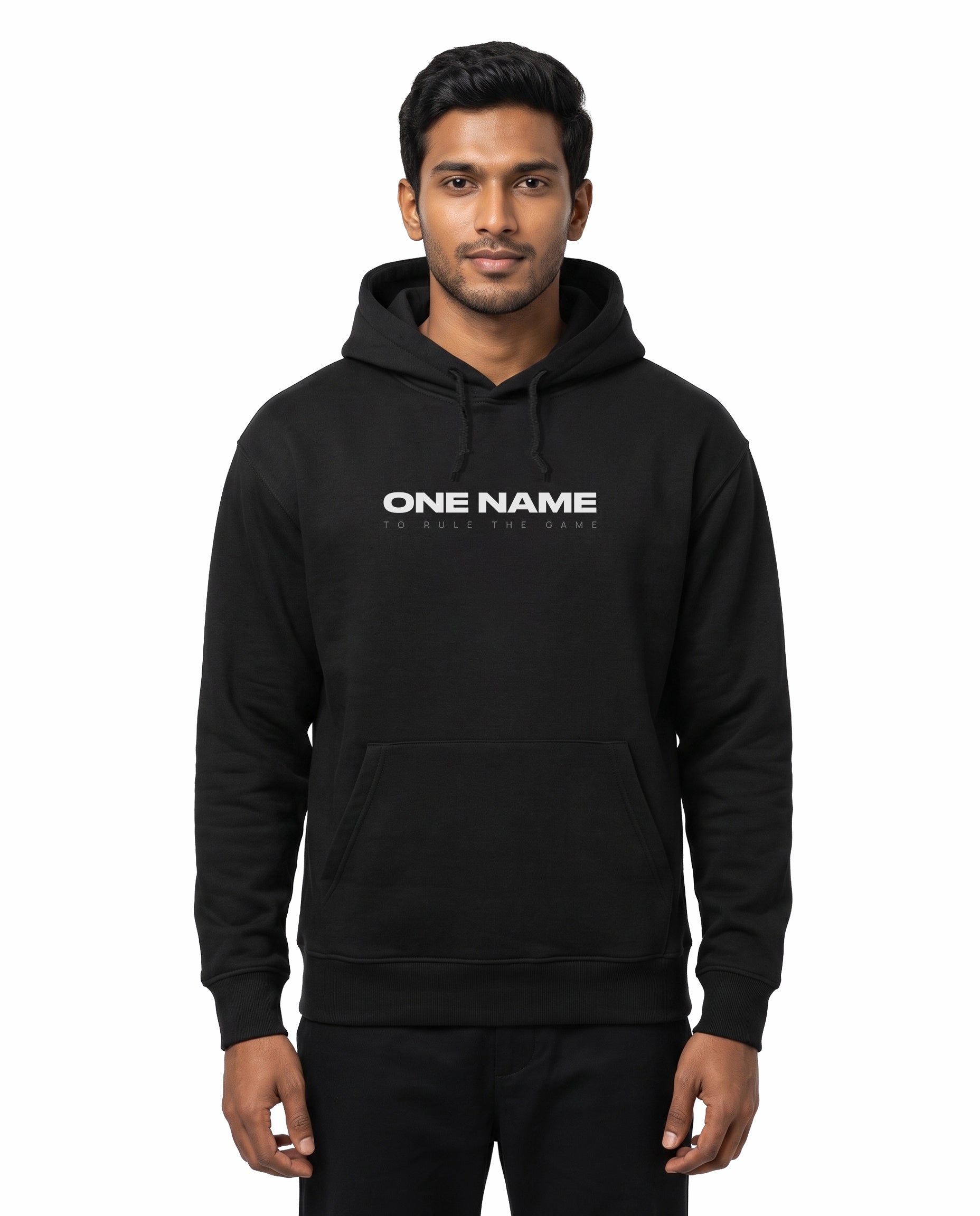 Front view of male model wearing ONE NAME unisex regular-fit hoodie in black in a studio setting.