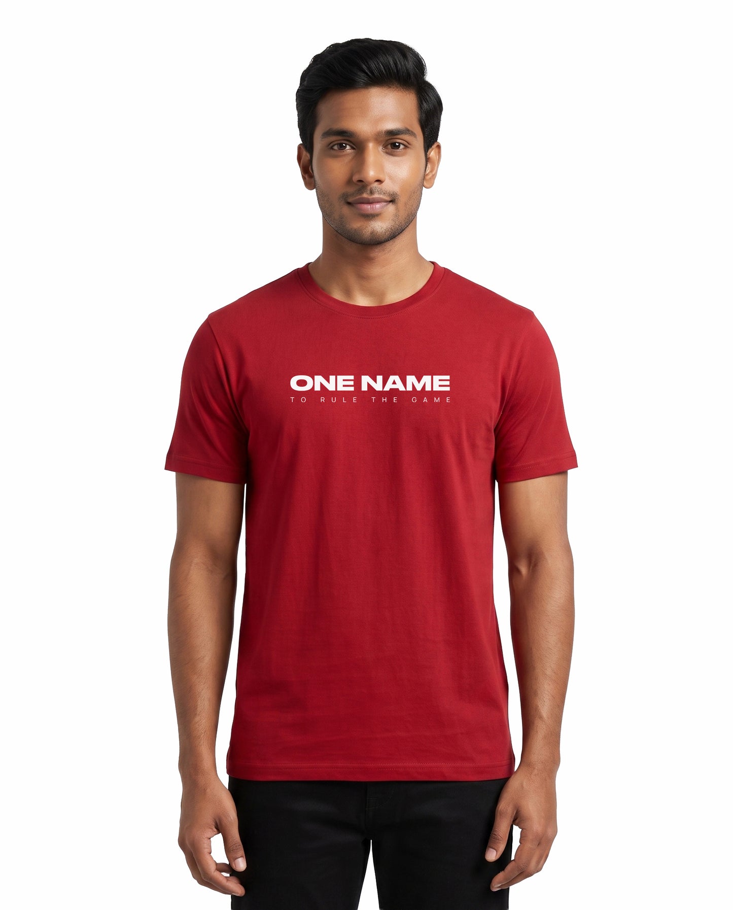 Front view of male model wearing ONE NAME men's regular-fit t-shirt in red in a studio setting.