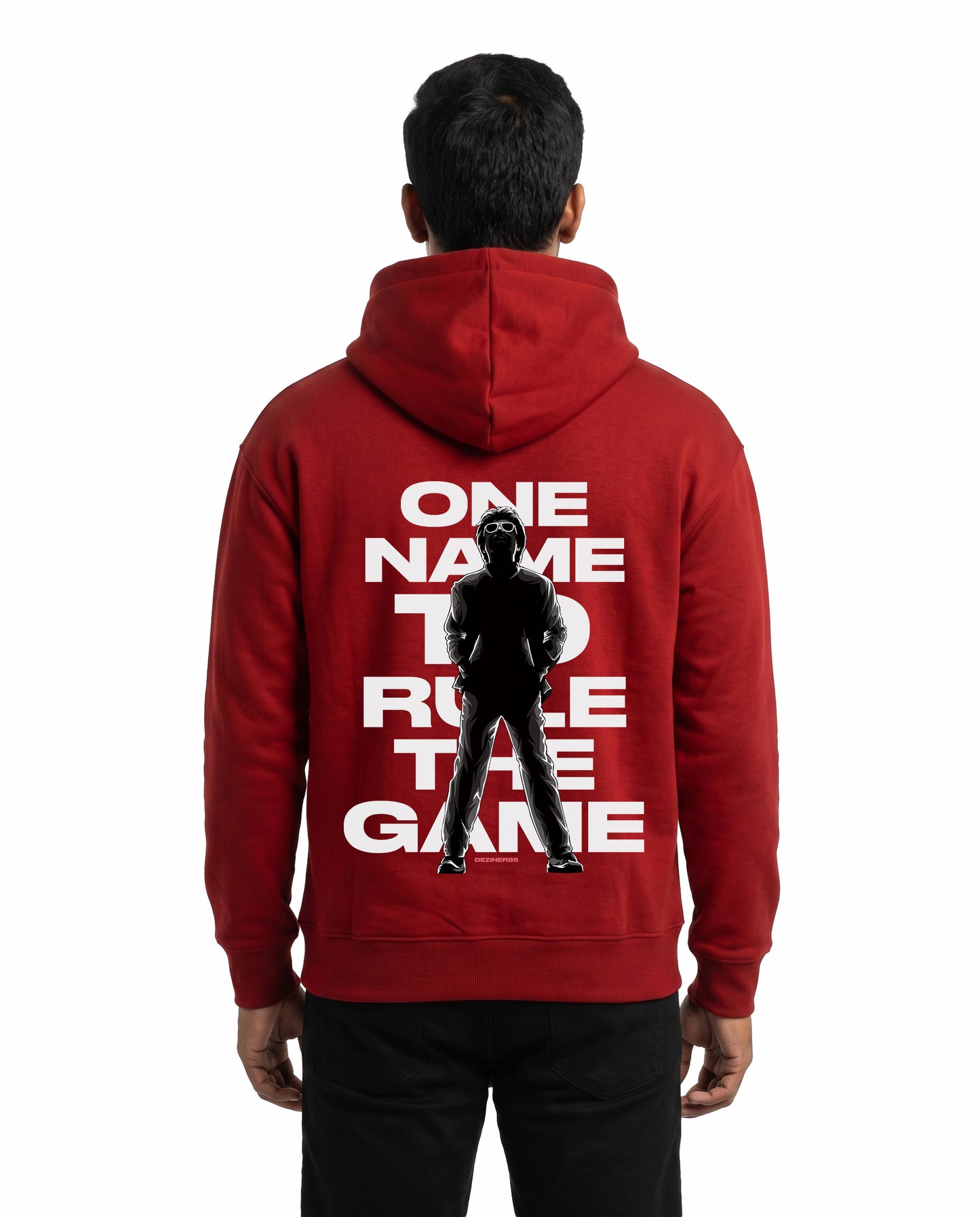 Back view of male model wearing ONE NAME unisex regular-fit hoodie in red in a studio setting.