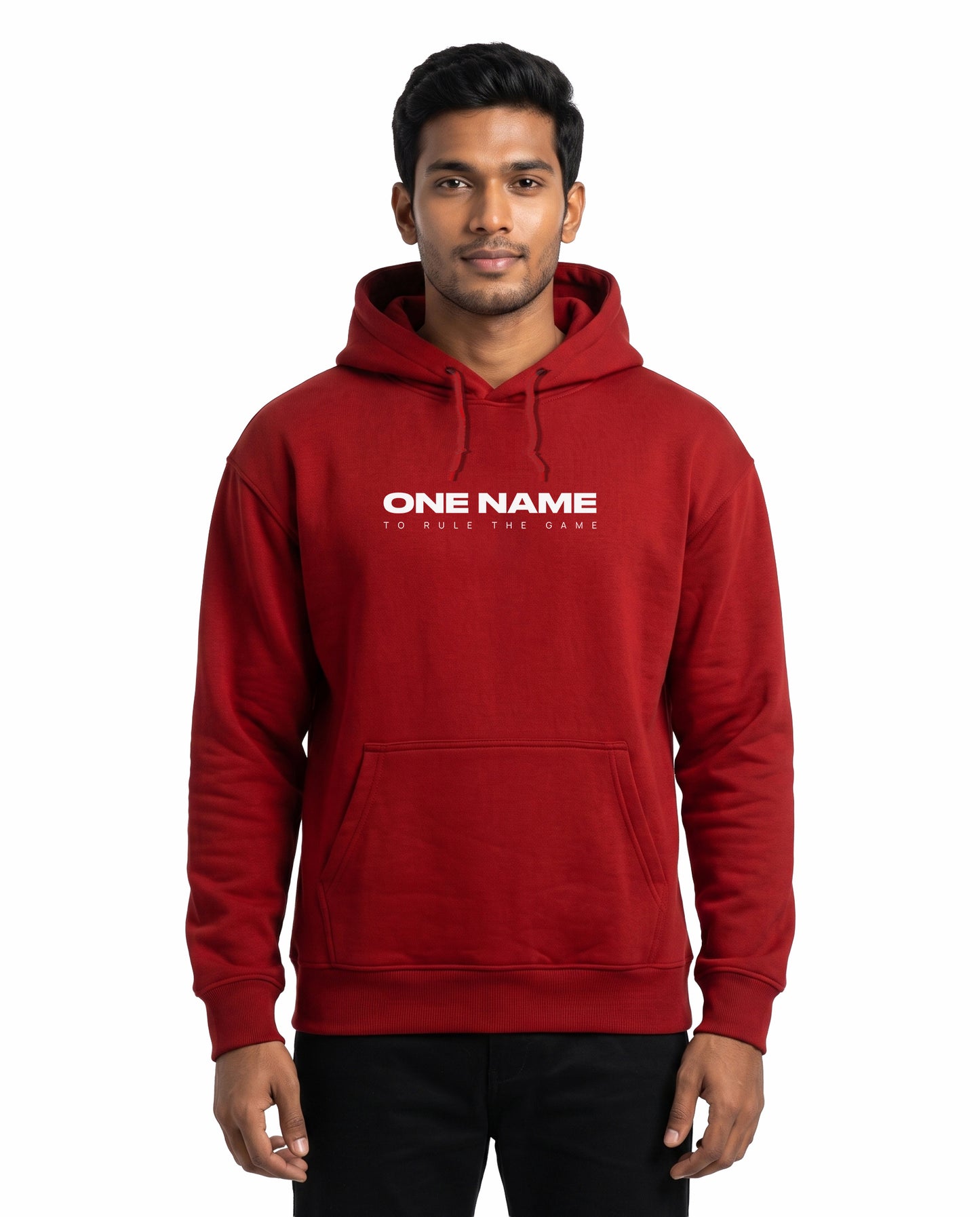 Front view of male model wearing ONE NAME unisex regular-fit hoodie in red in a studio setting.