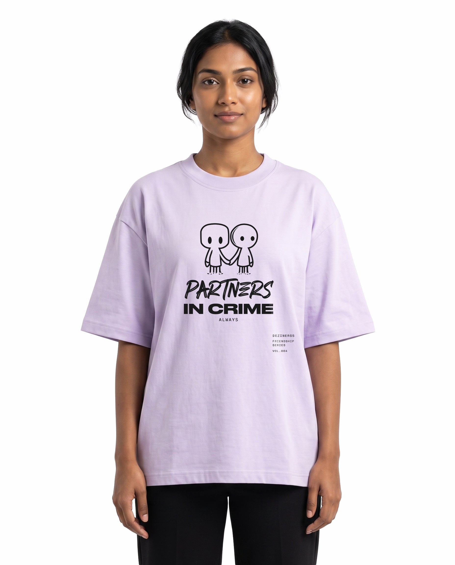 Front view of female model wearing PARTNERS IN CRIME unisex oversized graphic t-shirt in lavender in a studio setting.
