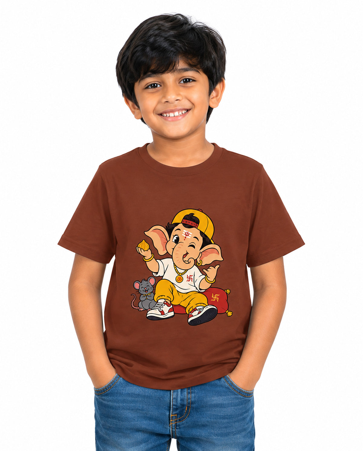 Front view of boy wearing PLAYFUL GANESHA - Boys Regular Fit T-Shirt in brick red in a studio setting.