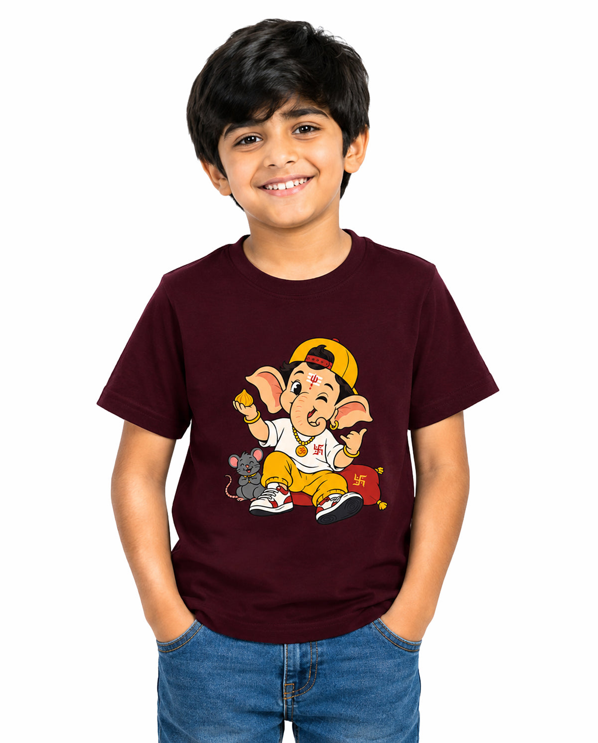 Front view of boy wearing PLAYFUL GANESHA - Boys Regular Fit T-Shirt in maroon in a studio setting.