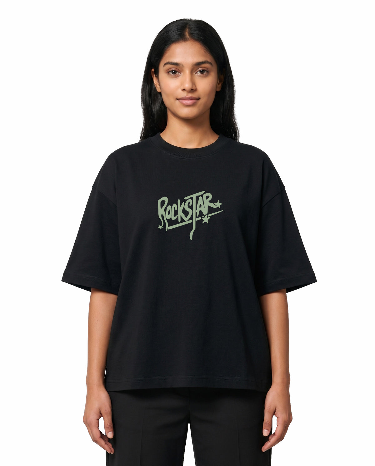 Front view of female model wearing ROCKSTAR - Unisex Oversized Graphic T-Shirt in black in a studio setting.