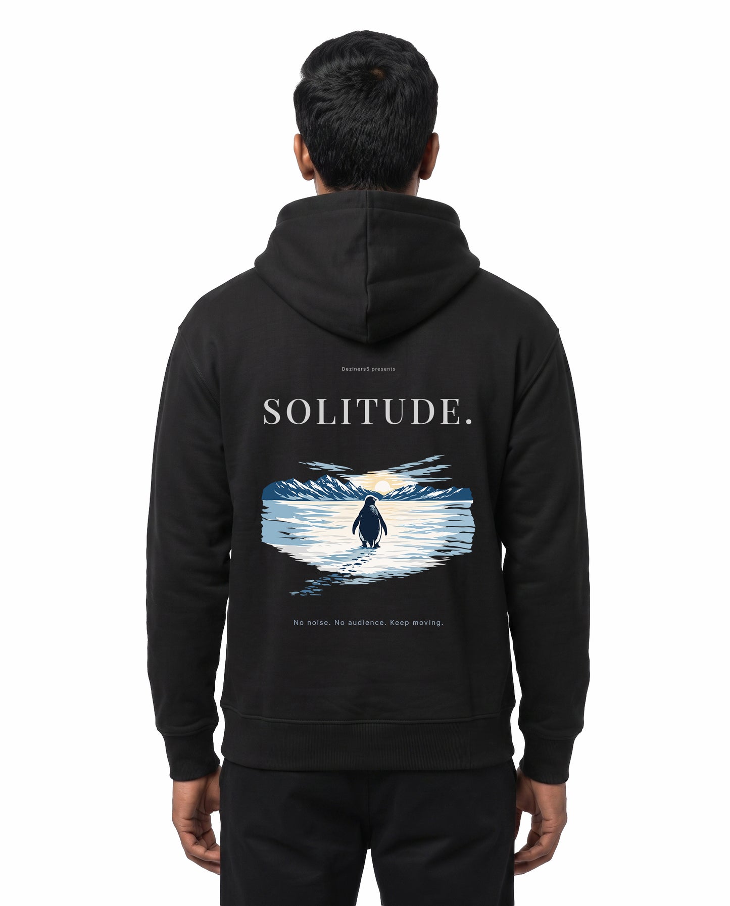 Back view of male model wearing SOLITUDE - unisex regular-fit hoodie in black in a studio setting.