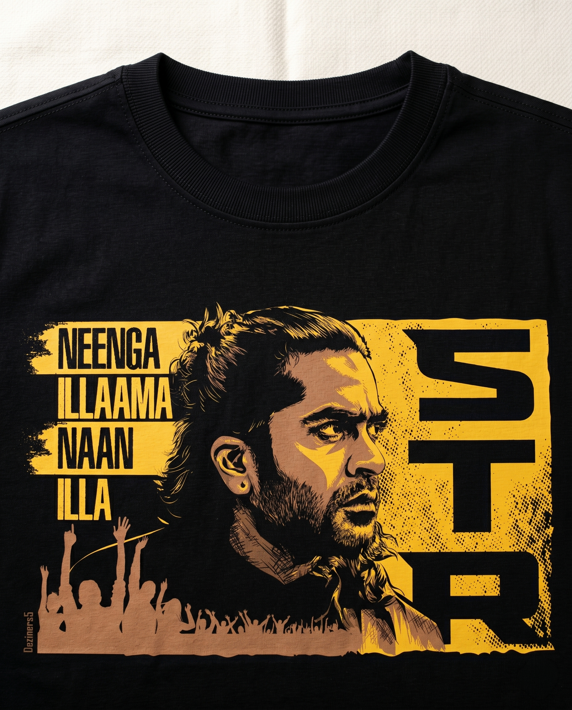 Close-up view of the STR TRIBUTE graphic print highlighting premium print quality and artwork details on a black men's regu.ar-fit t-shirt.