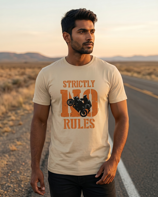Young South Indian male wearing the STRICTLY NO RULES men's regular-fit t-shirt in beige in an open highway setting.