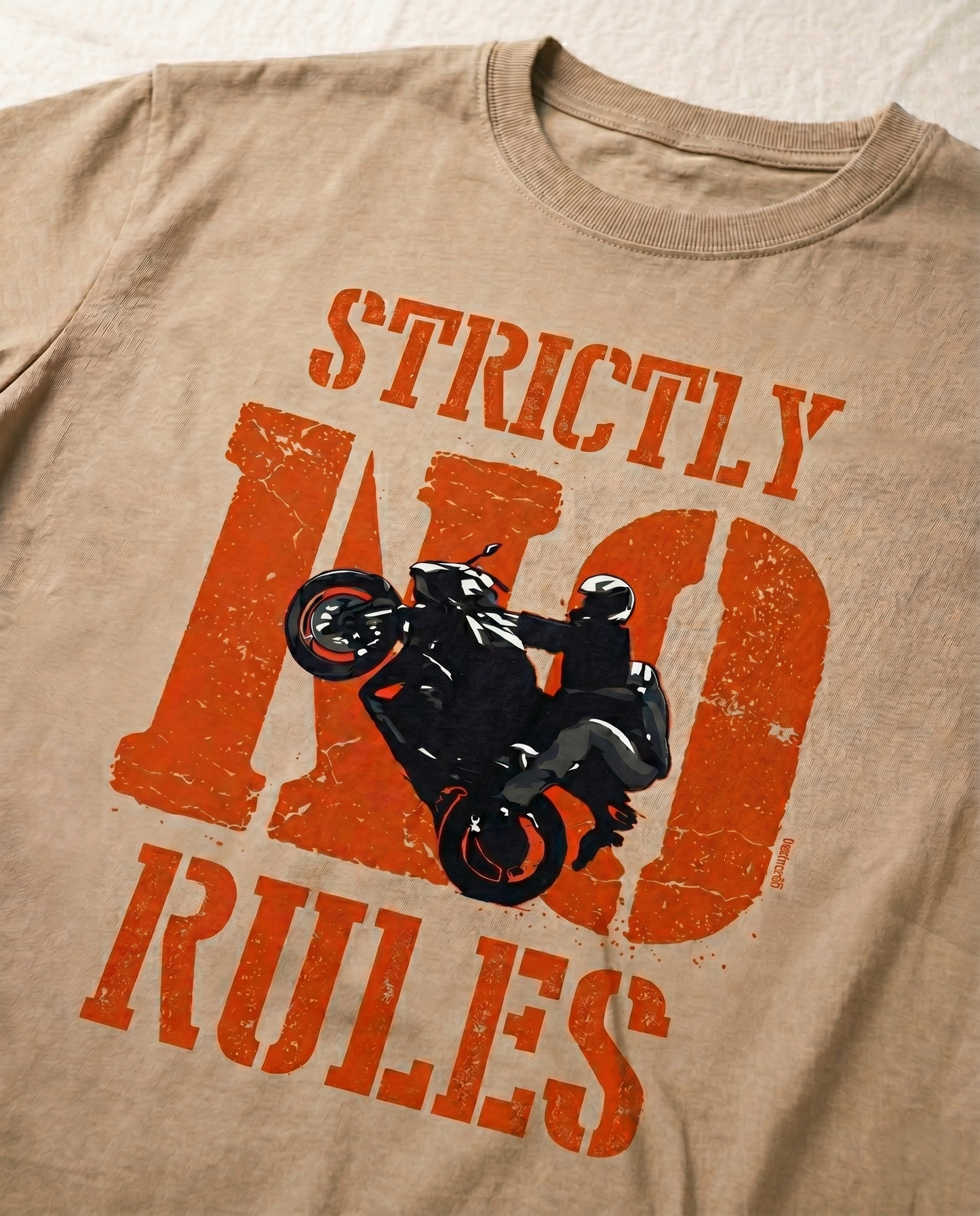 Detailed close-up of the STRICTLY NO RULES graphic print highlighting typography and premium print quality on a beige men's regular-fit t-shirt.