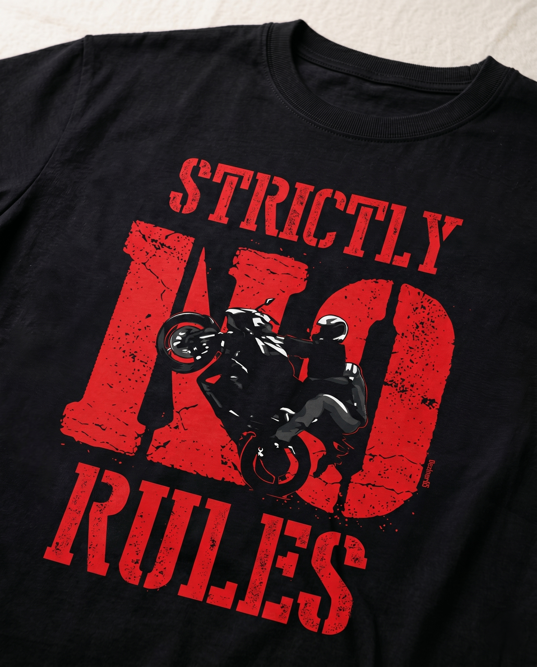 Detailed close-up of the STRICTLY NO RULES graphic print highlighting typography and premium print quality on a black men's regular-fit t-shirt.