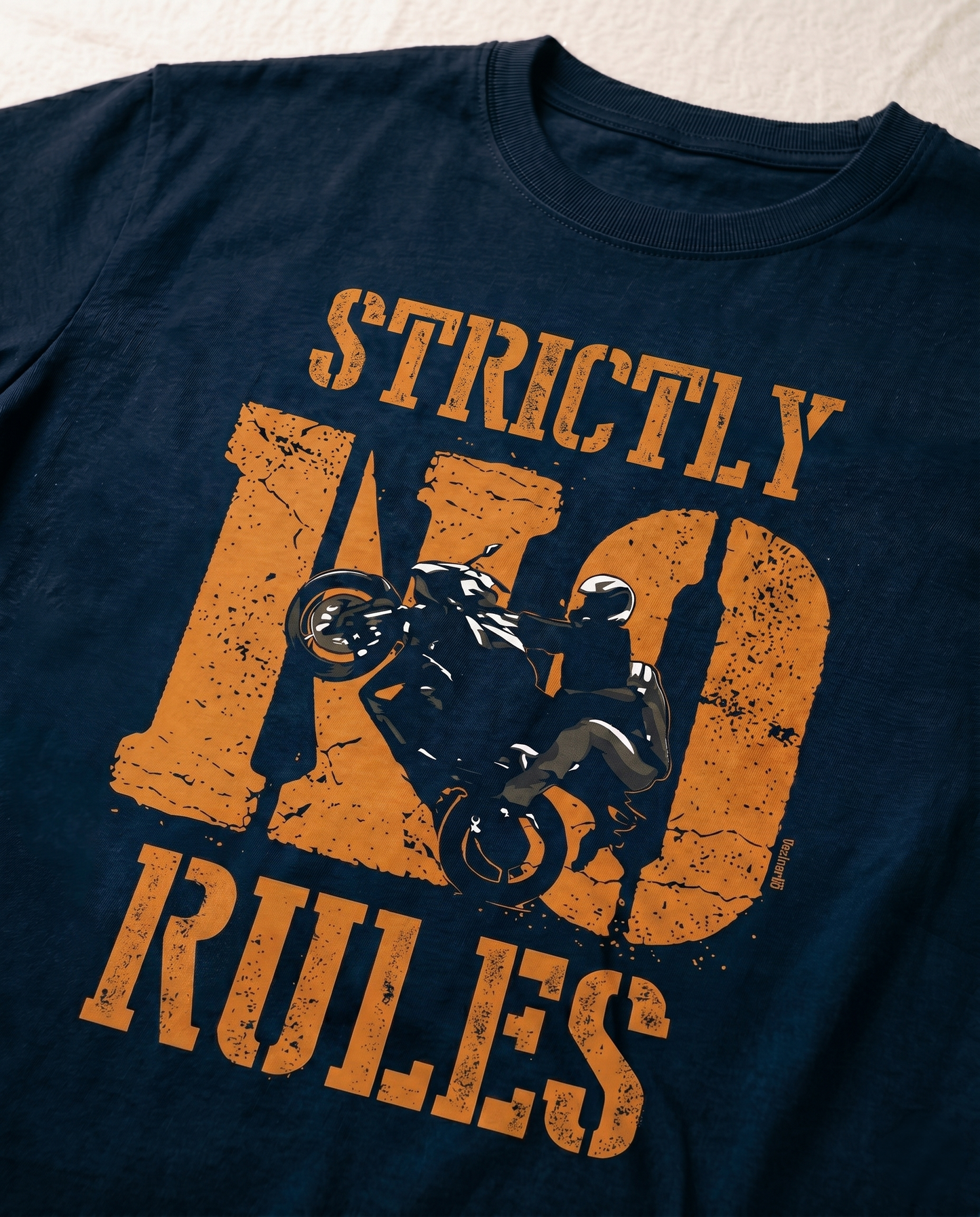 Detailed close-up of the STRICTLY NO RULES graphic print highlighting typography and premium print quality on a navy blue men's regular-fit t-shirt.