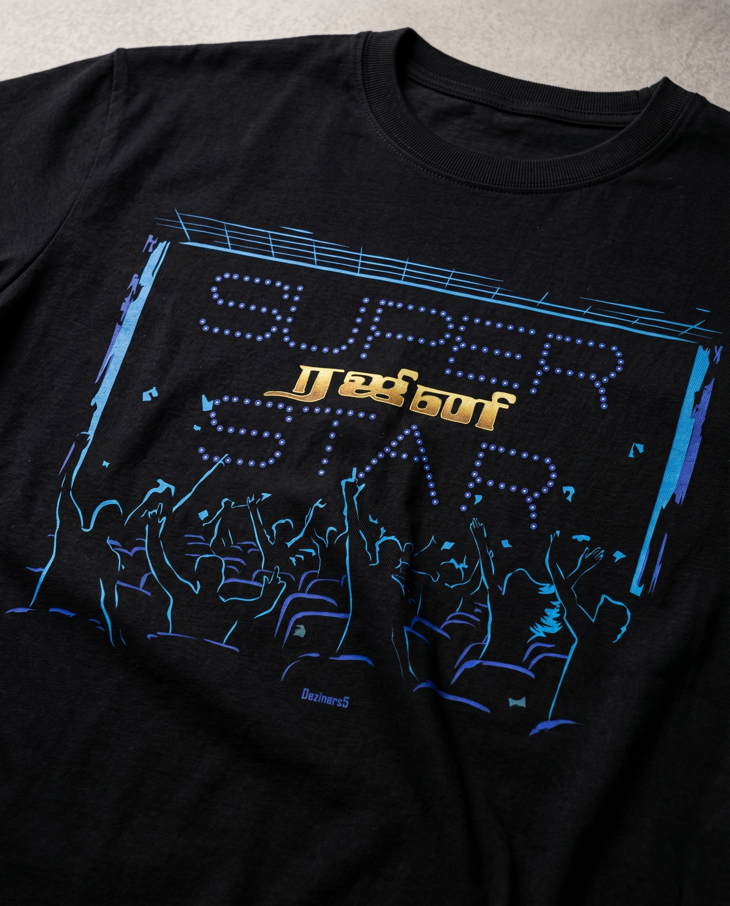 Close-up DTG print detail of SUPERSTAR MANIA artwork on men's black regular fit t-shirt