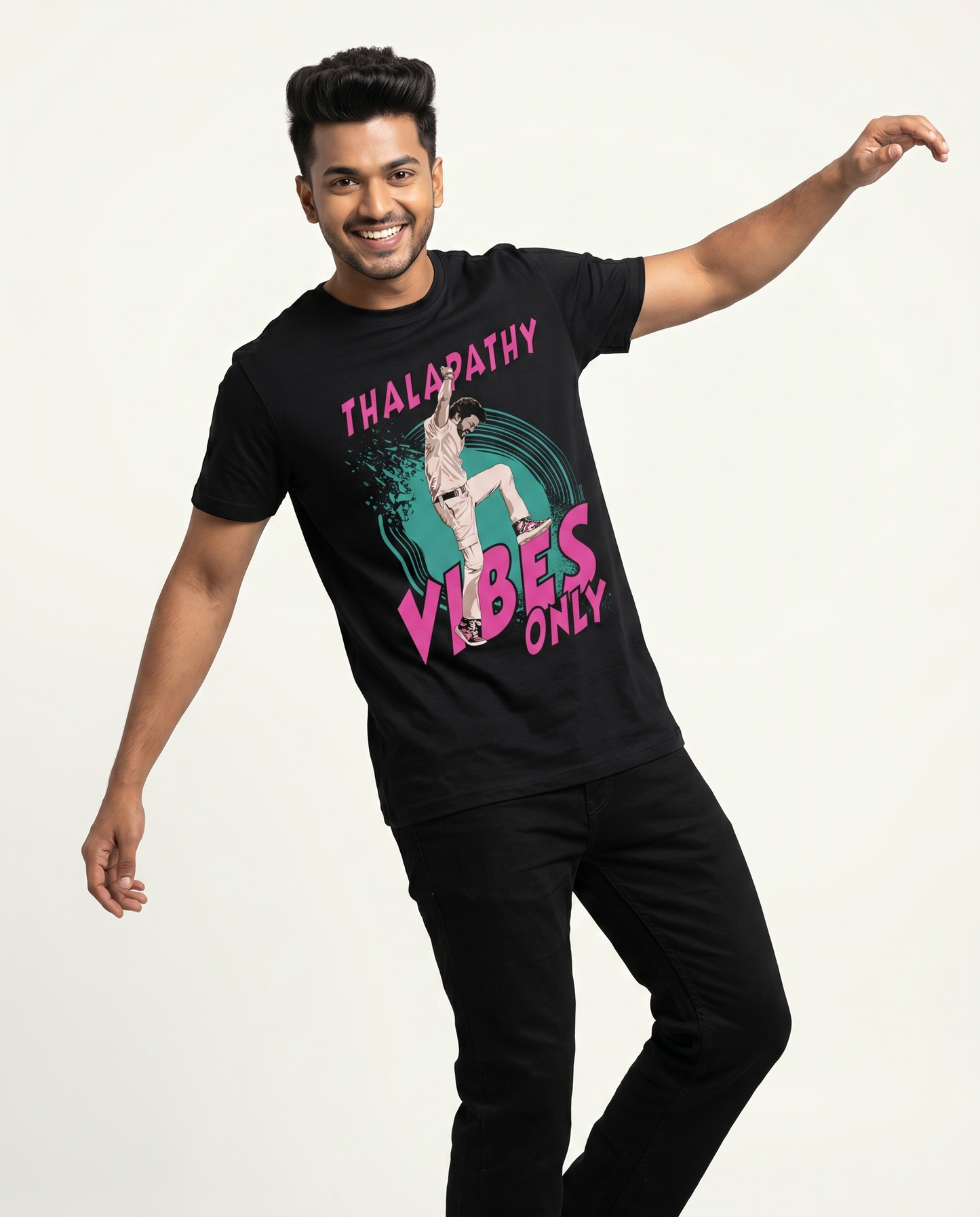 Young South Indian male wearing THALAPATHY VIBES men's regular-fit t-shirt in black in premium studio fashion portrait.