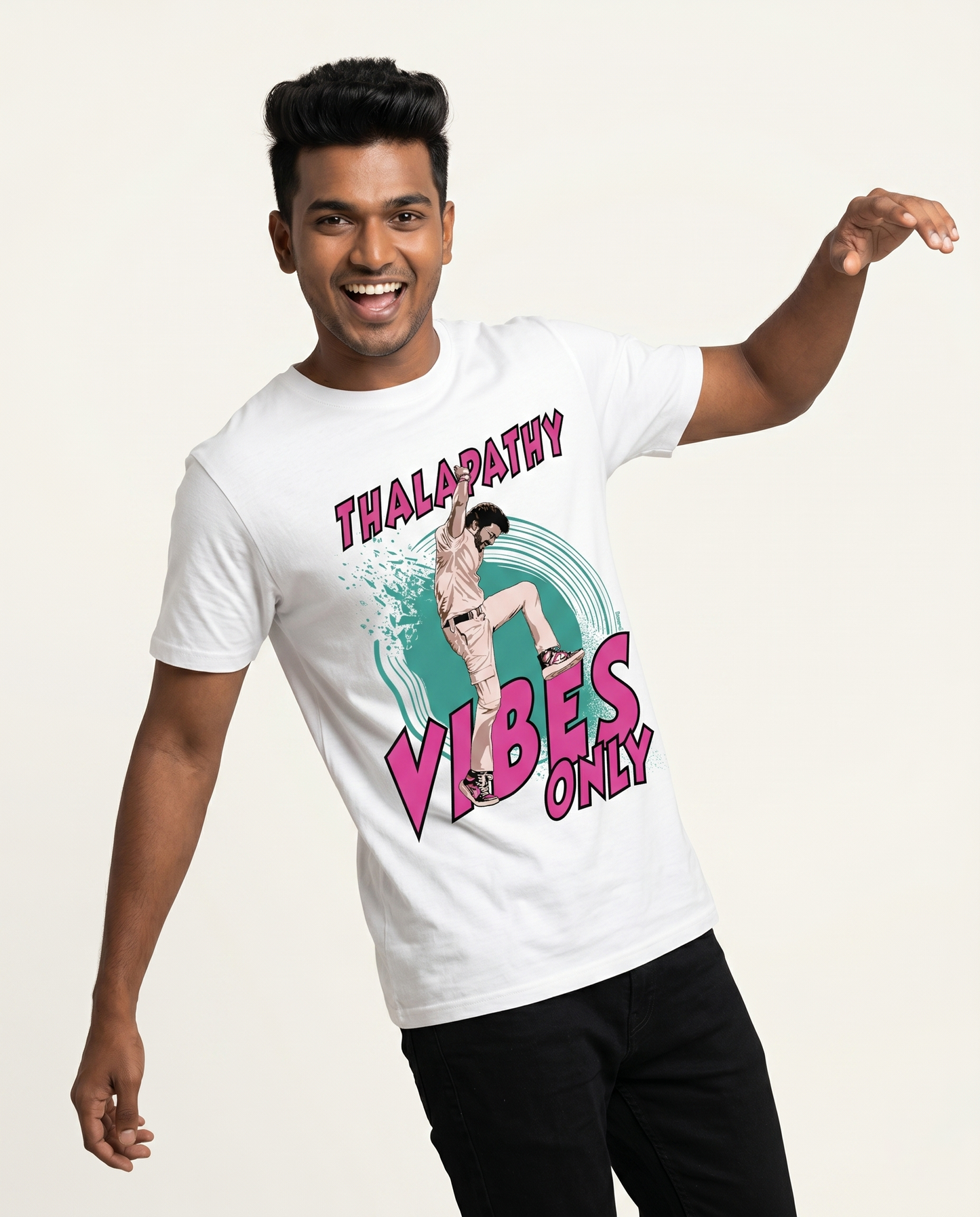 Young South Indian male wearing THALAPATHY VIBES men's regular-fit t-shirt in white in premium studio fashion portrait.