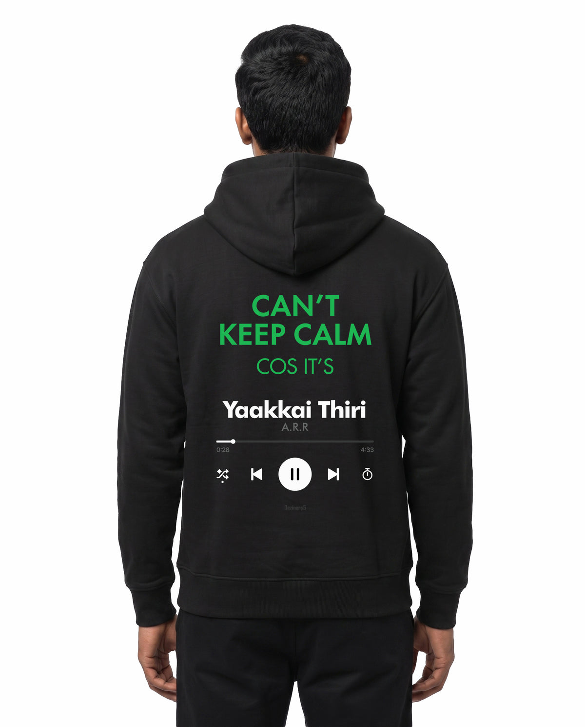 Back view of male model wearing THE ARR TRACK - TAMIZH - Unisex Regular Fit Hoodie in black in a studio setting.