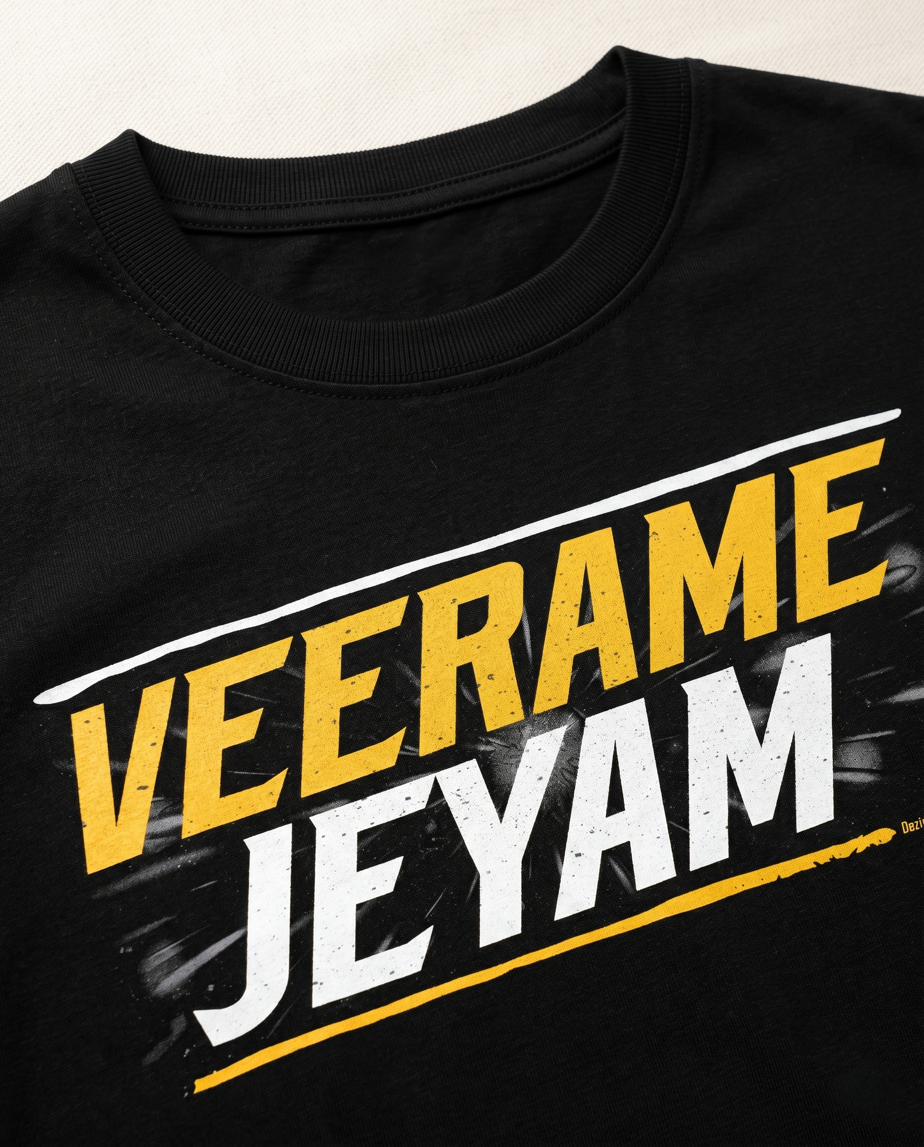Detailed close-up of the VEERAME JEYAM typography print showcasing premium print quality and design details on a black men's regular-fit t-shirt.
